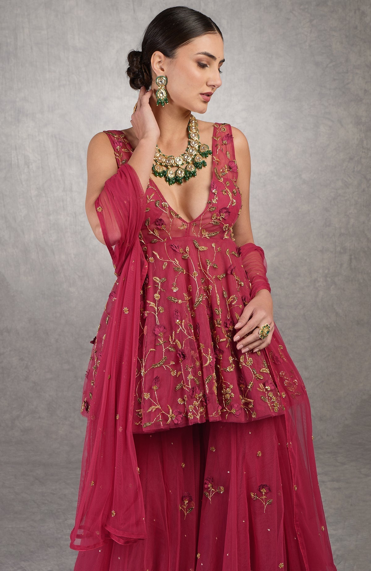 Red sharara set with 3D floral and zardozi hand embroidery on soft tulle fabric.