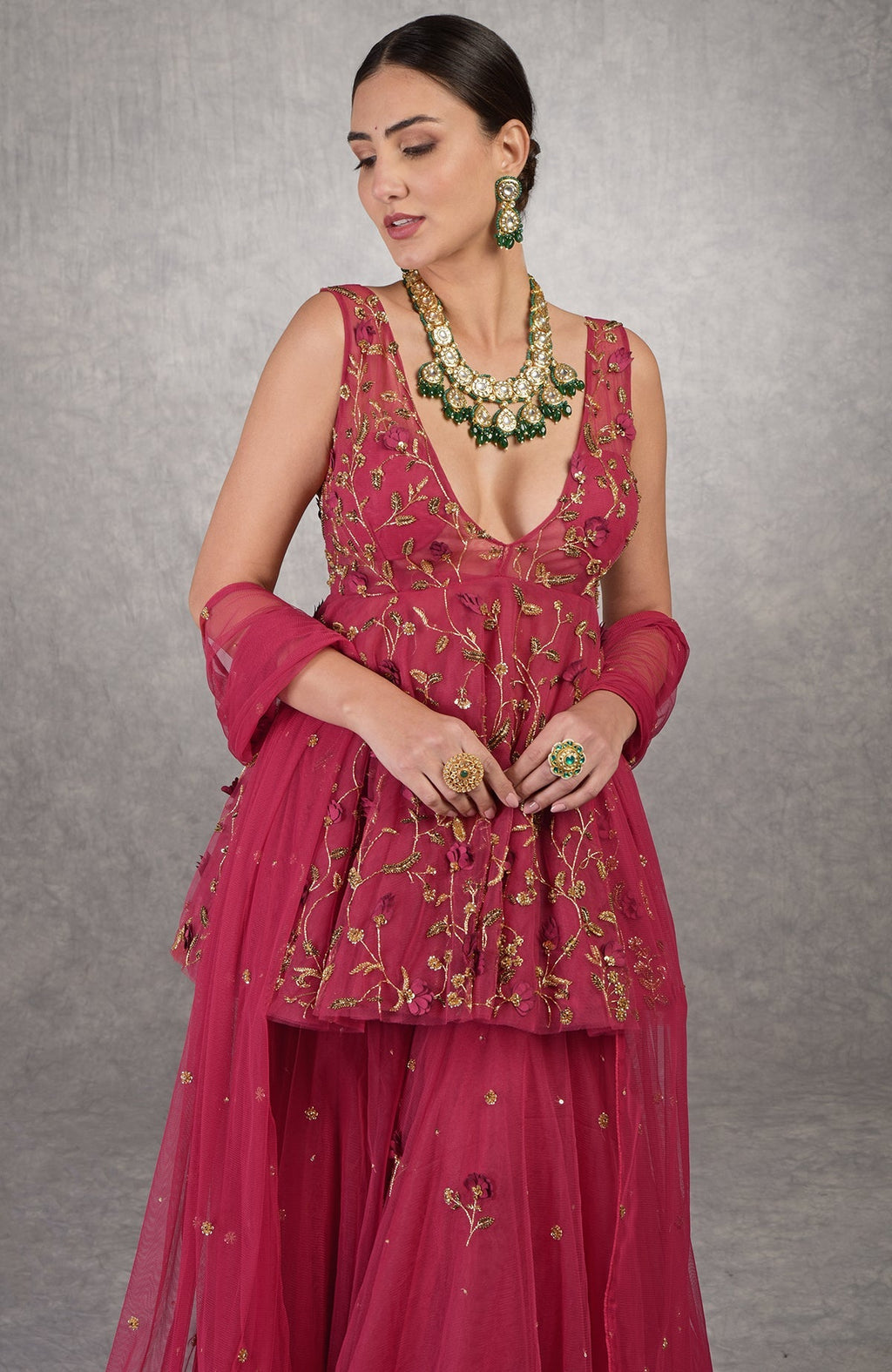 Red sharara set with 3D floral and zardozi hand embroidery on soft tulle fabric.