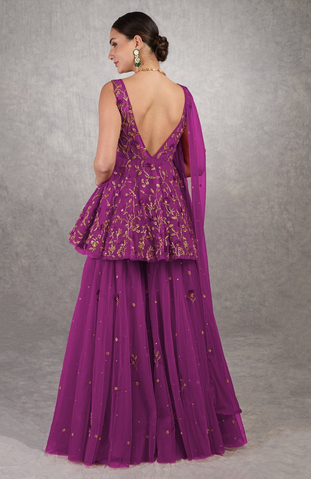 Berry-colored sharara set with 3-D floral and gold zardozi hand embroidery on tulle fabric.