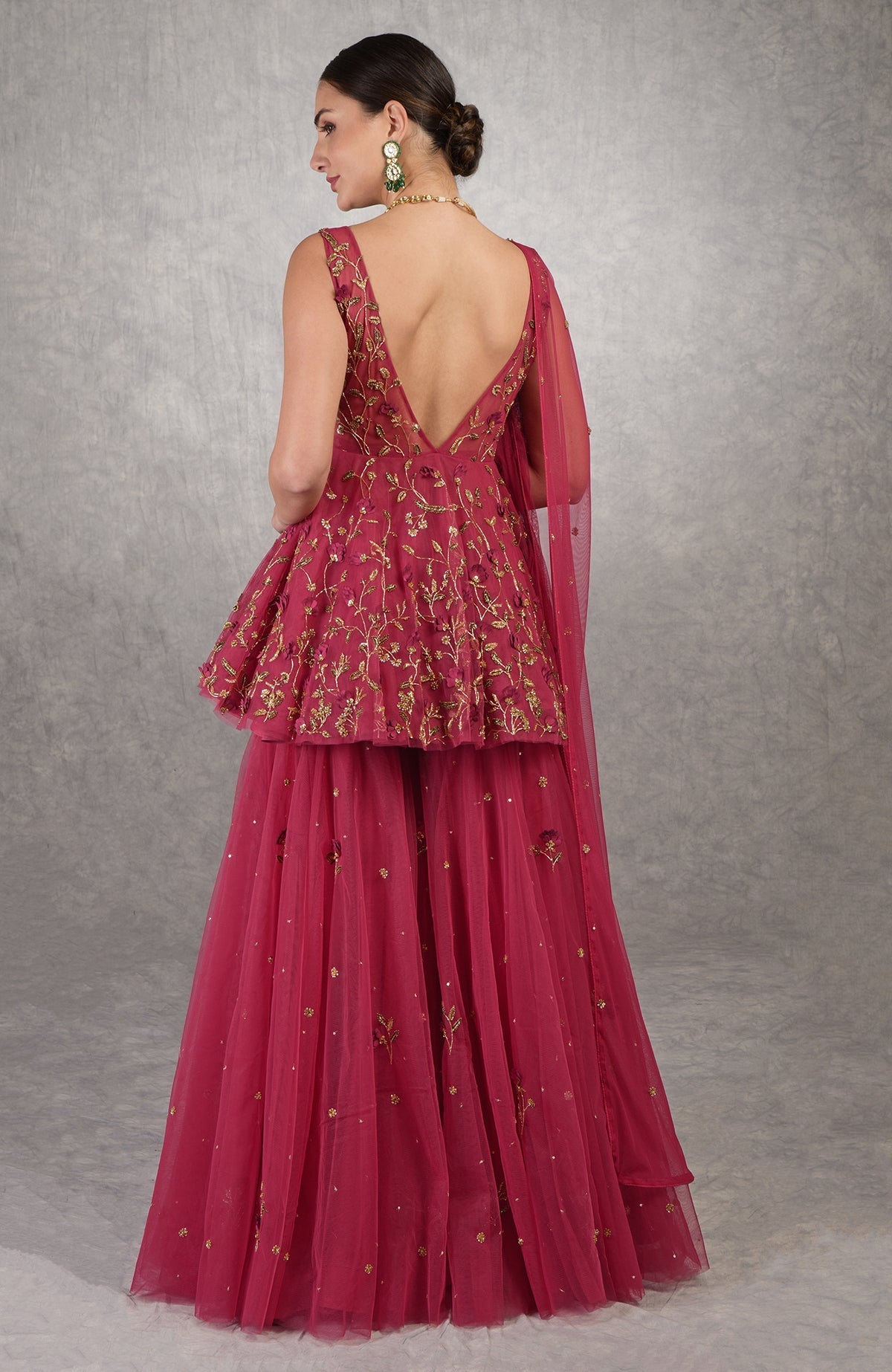 Red sharara set with 3D floral and zardozi hand embroidery on soft tulle fabric.