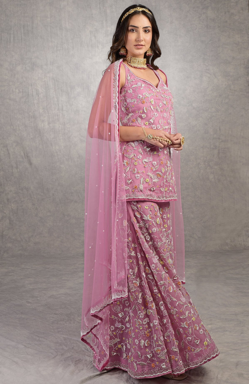 Mauve orchid sharara set with hand-embroidered floral motifs and velvet trims on silk organza.