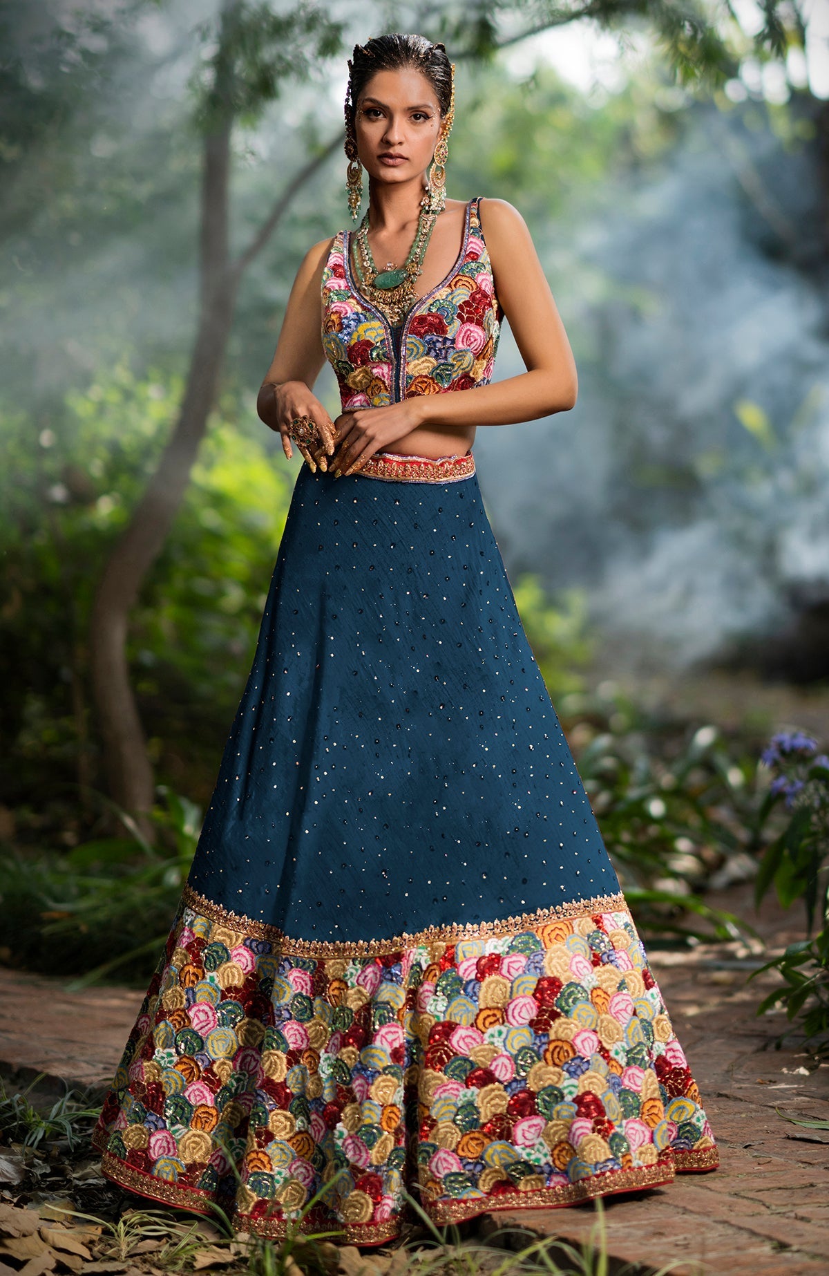 Navy blue multi-color hand embroidered lehenga with a floral blouse.