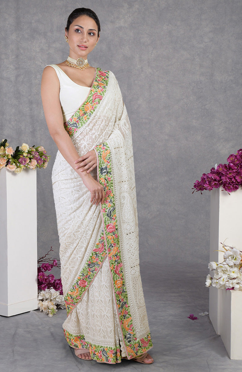 Ivory Georgette saree with hand-embroidered Chikankari and Parsi Gara floral and bird motifs border