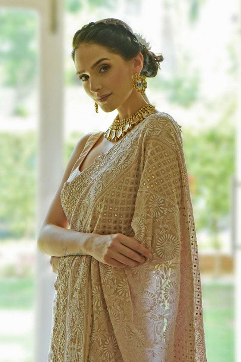 Oyster pink georgette saree with hand-embroidered chikankari and rose gold gota patti borders