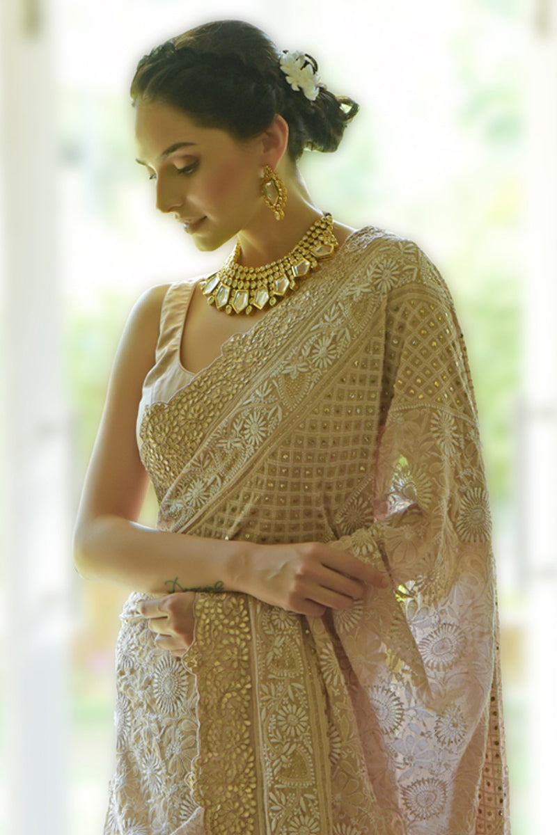 Oyster pink Georgette saree with hand-embroidered chikankari, kamdani, and rose gold gota patti borders