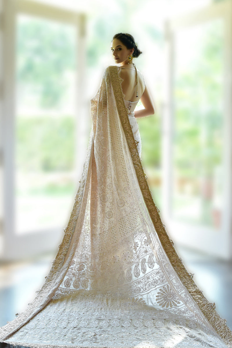 Oyster pink georgette saree with hand-embroidered chikankari and rose gold gota patti borders