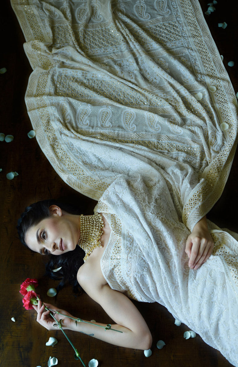 Ivory georgette saree with intricate floral Chikankari and gold cut dana hand embroidery