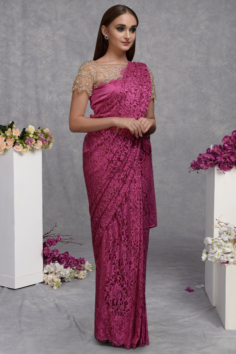 Deep pink French Chantilly lace saree with a hand-embroidered blouse.