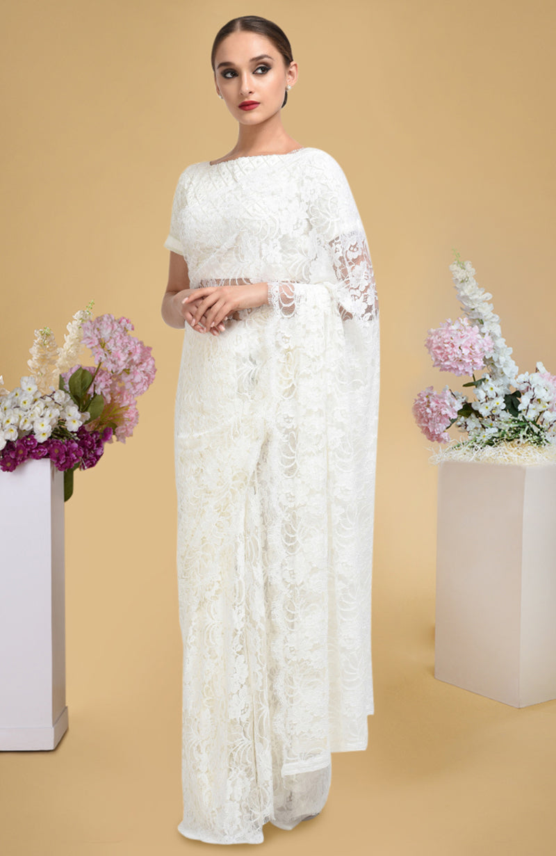 Ivory French Chantilly lace saree with pearl-beaded hand-embroidered satin silk blouse