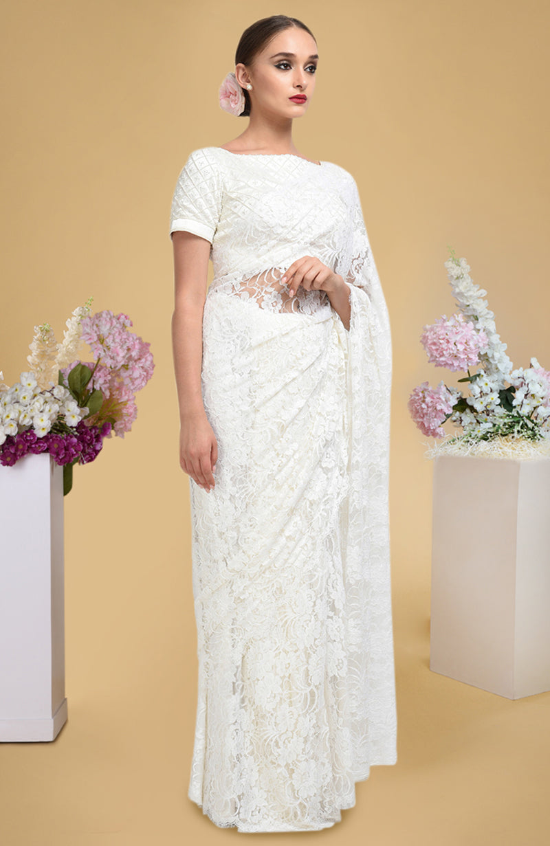 Ivory French Chantilly lace saree with pearl-beaded hand-embroidered satin blouse in lattice pattern