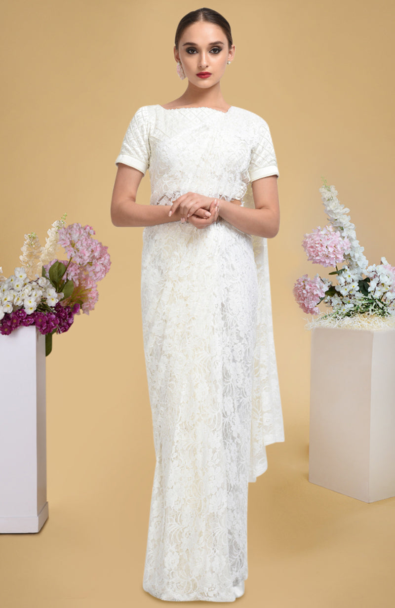 Ivory French Chantilly lace saree with pearl-beaded hand-embroidered satin blouse in lattice pattern