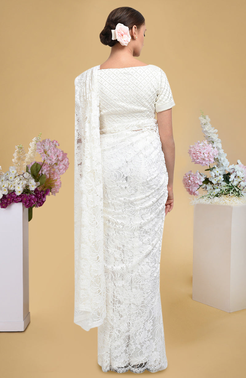 Ivory French Chantilly lace saree with pearl beaded hand embroidered satin silk blouse