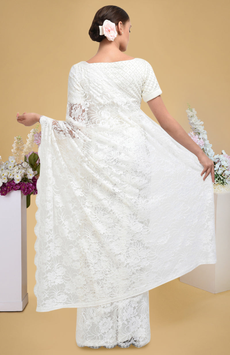 Ivory French Chantilly lace saree with pearl-beaded hand-embroidered satin blouse in lattice pattern