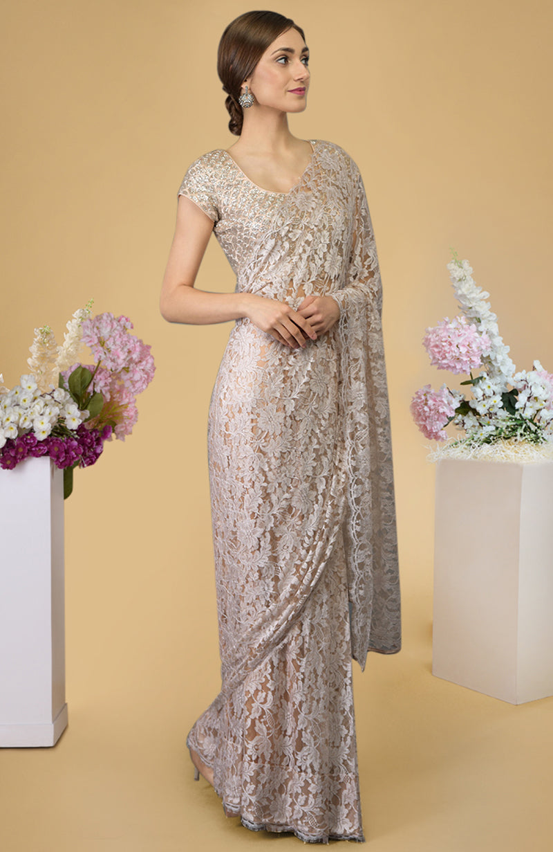Nude peach saree with French Chantilly lace and hand embroidered satin silk blouse fabric.