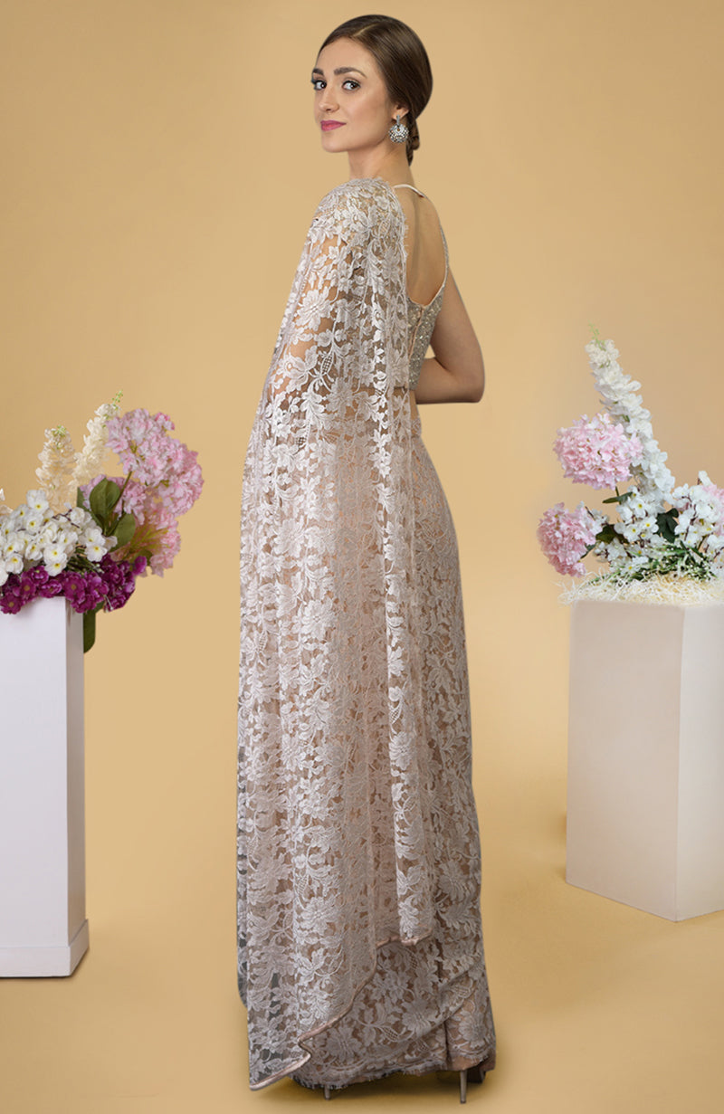 Nude peach saree with French Chantilly lace and hand embroidered satin silk blouse fabric.