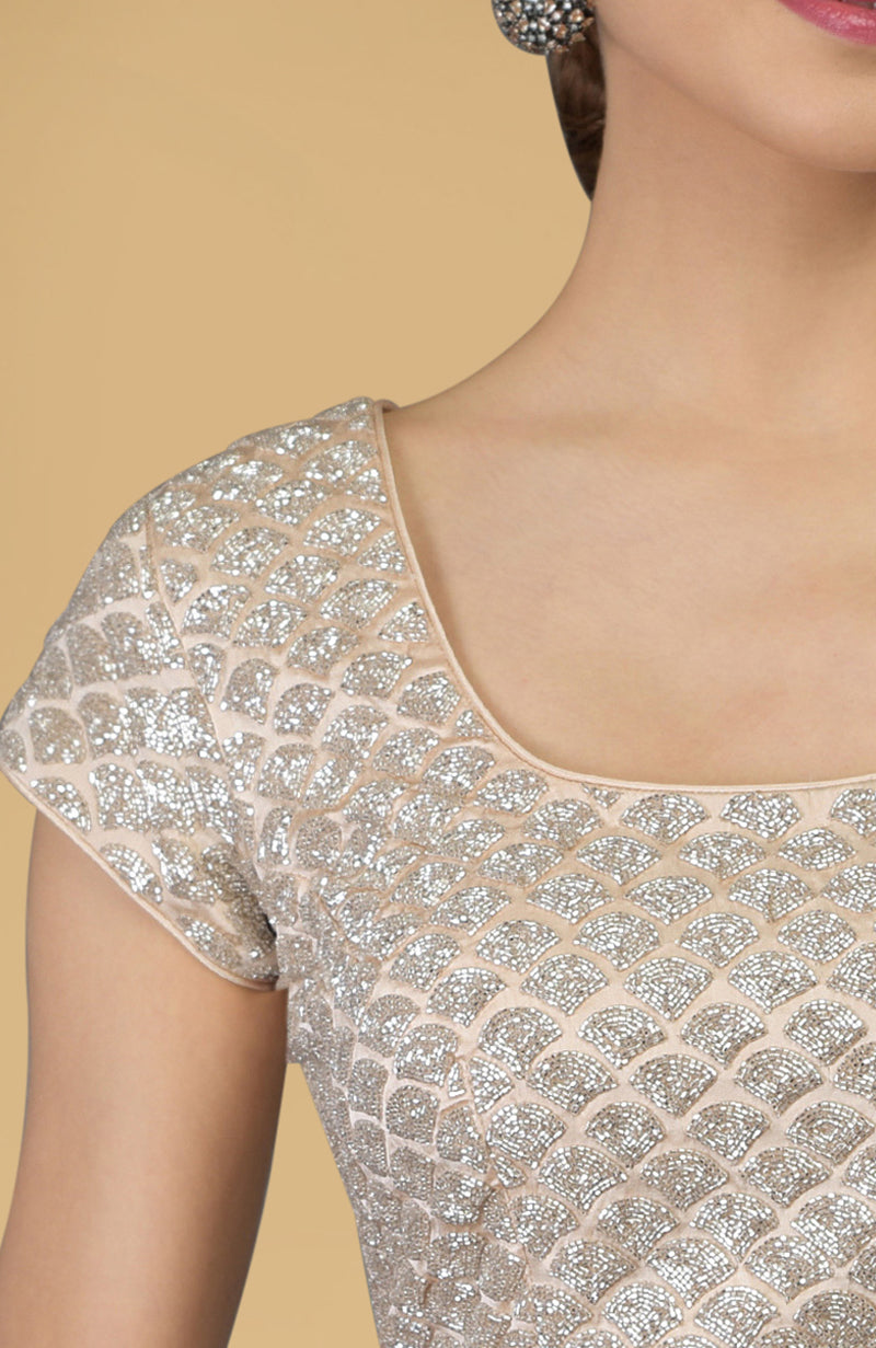 Nude peach saree with French Chantilly lace and hand embroidered satin silk blouse fabric.