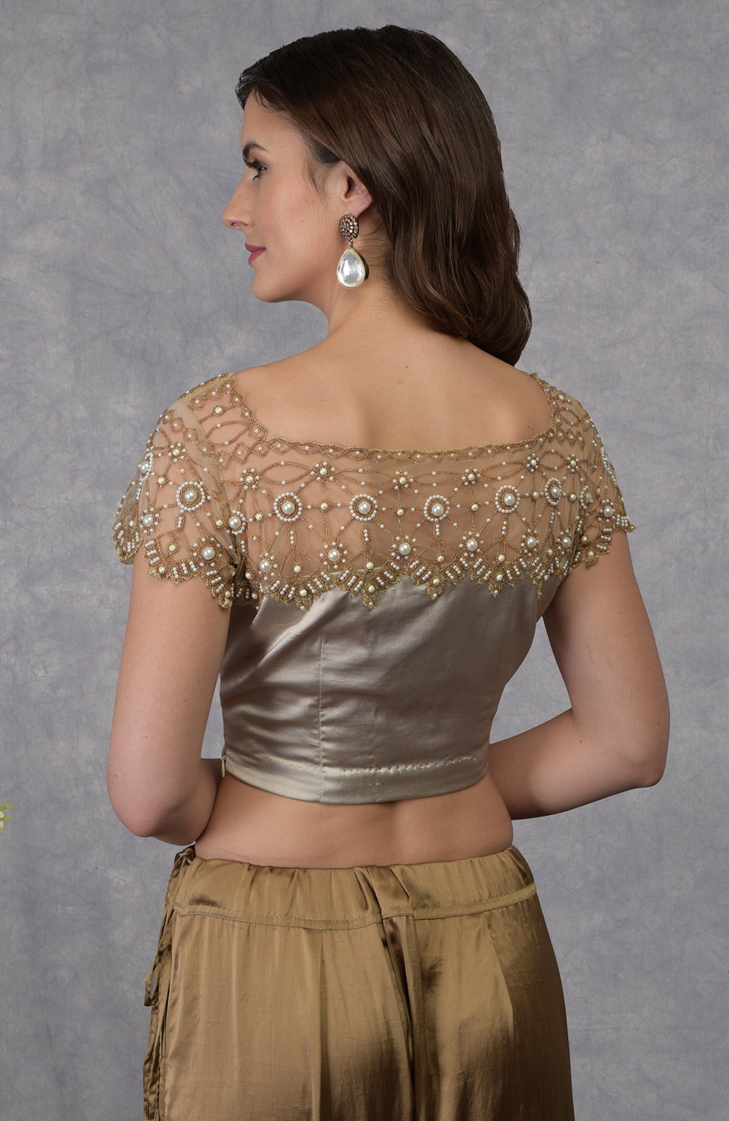 Beige French Chantilly lace saree with embroidered satin blouse featuring pearl bead floral patterns