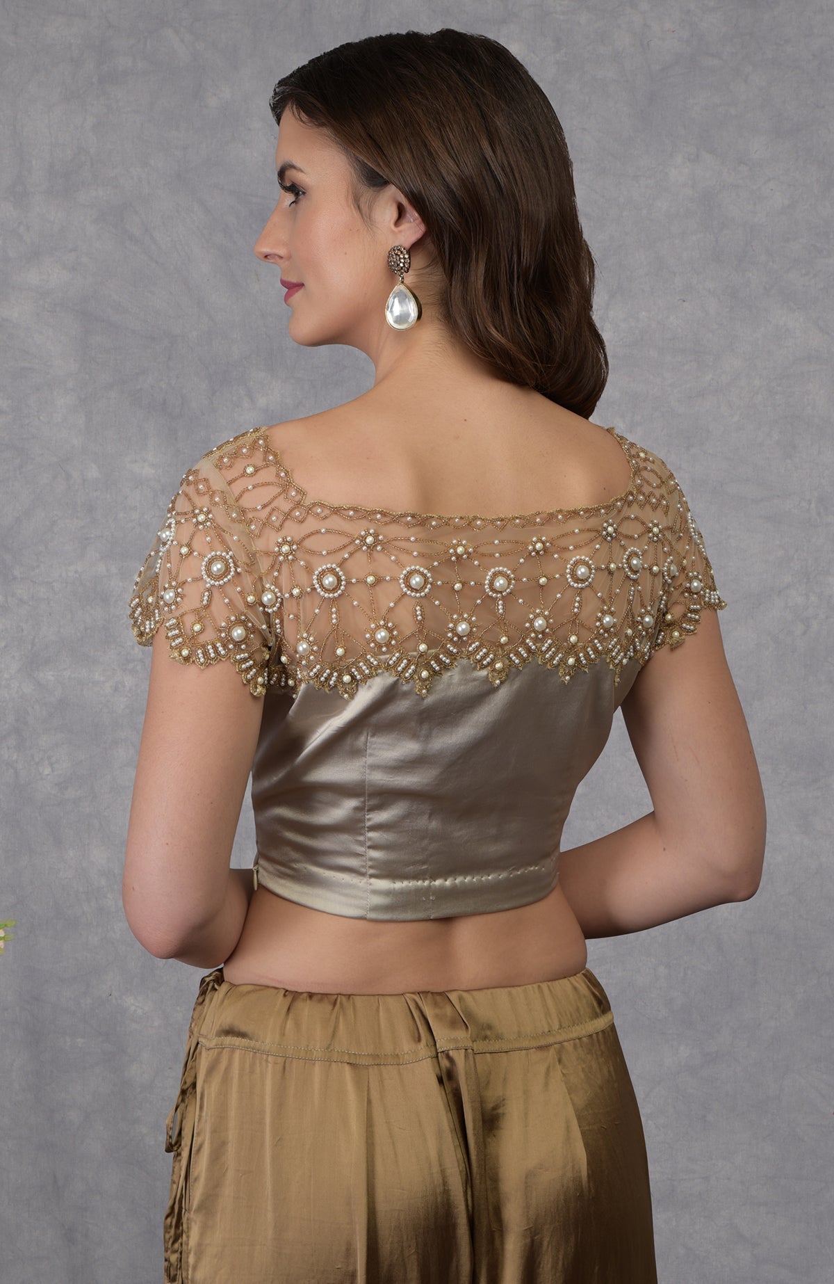 Beige French Chantilly lace saree with embroidered satin blouse featuring pearl bead floral patterns