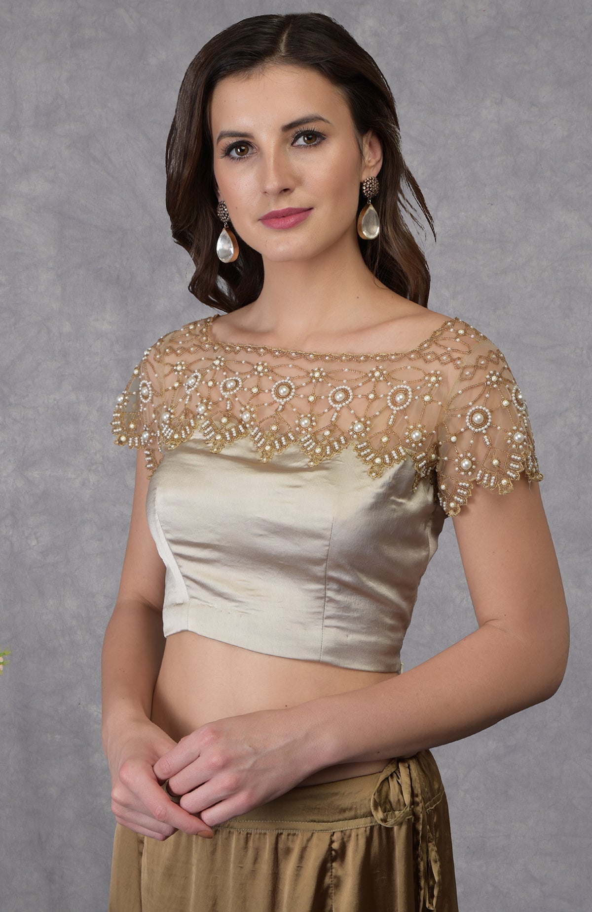 Beige French Chantilly lace saree with embroidered satin blouse featuring pearl bead floral lattice design