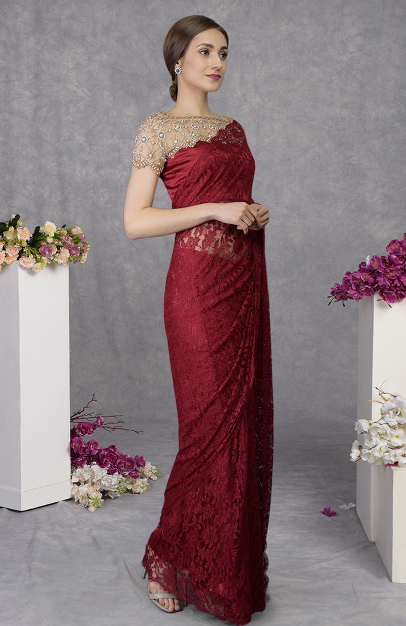 Maroon French Chantilly lace saree with hand embroidered pearl bead satin blouse