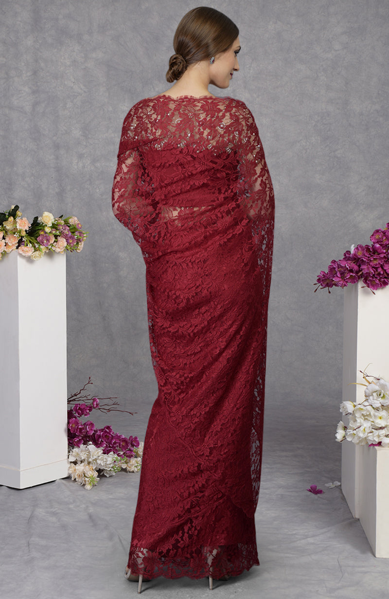 Maroon French Chantilly lace saree with hand embroidered pearl bead satin blouse