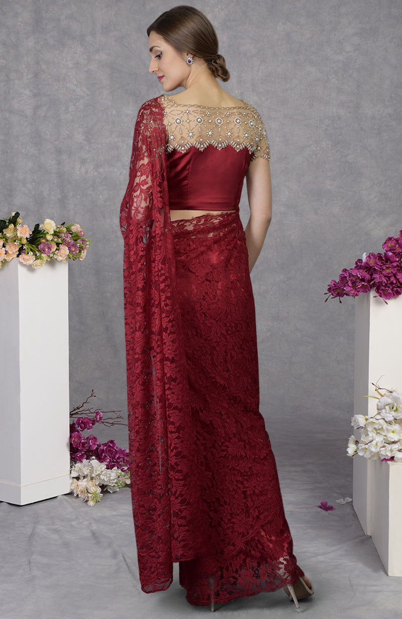 Maroon French Chantilly lace saree with hand embroidered pearl bead satin blouse