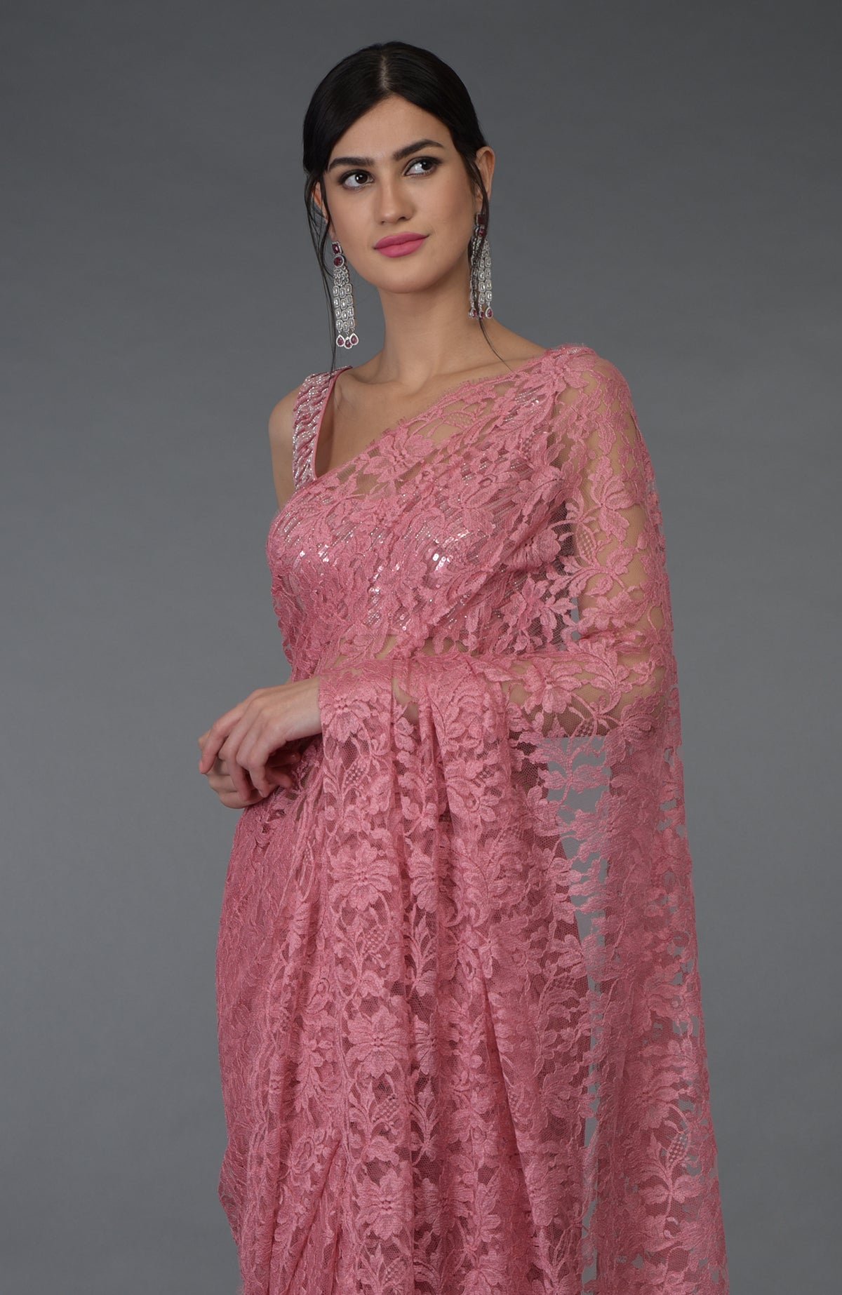 Pressed rose French Chantilly lace saree with hand embroidered sequin and bead blouse.