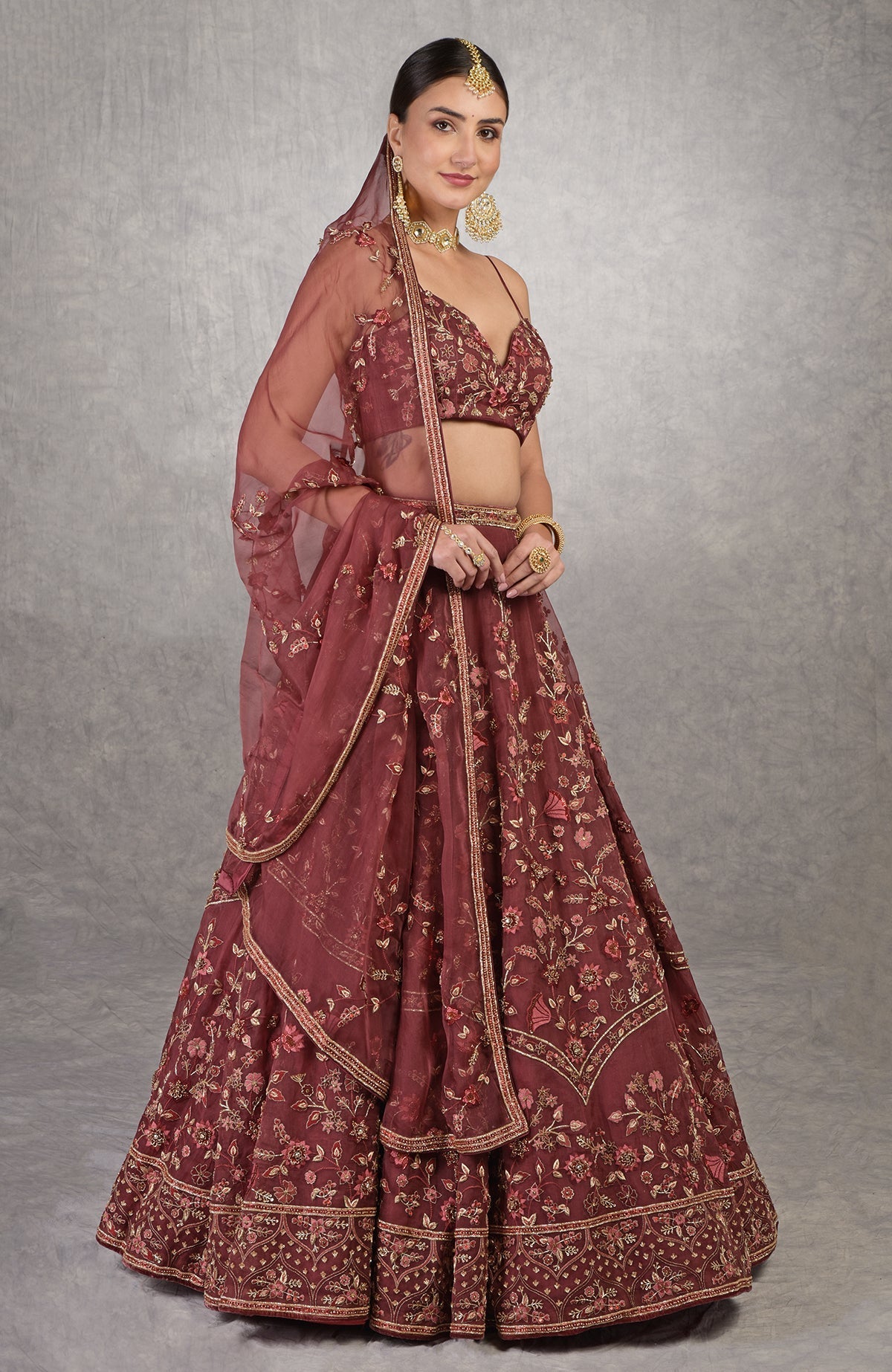 Burgundy wine lehenga set with floral embroidery, crystal embellishments, and noodle strap blouse