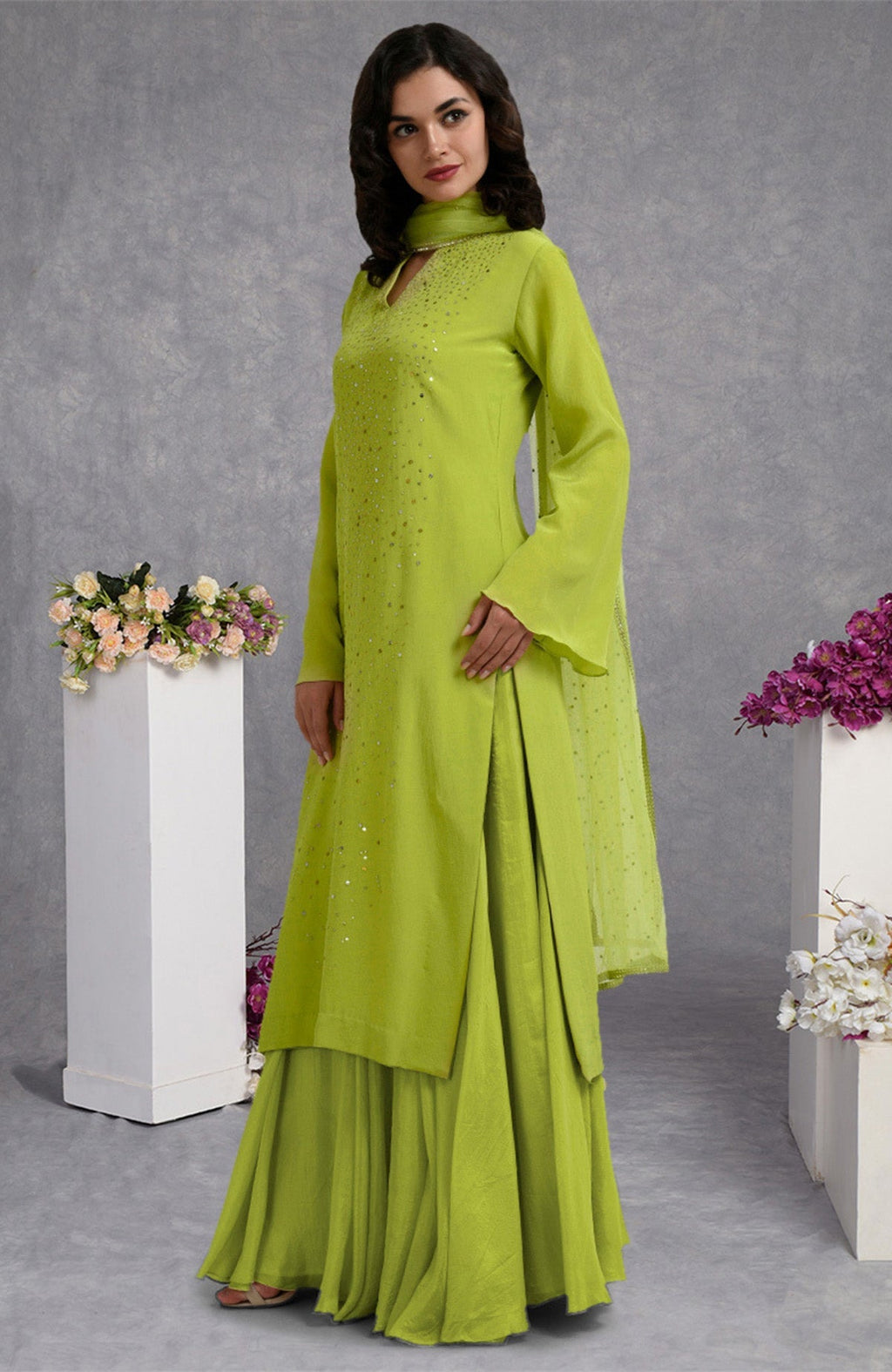 Lime punch crepe skirt set with hand-embroidered gold and silver sequins and sheer bell sleeves