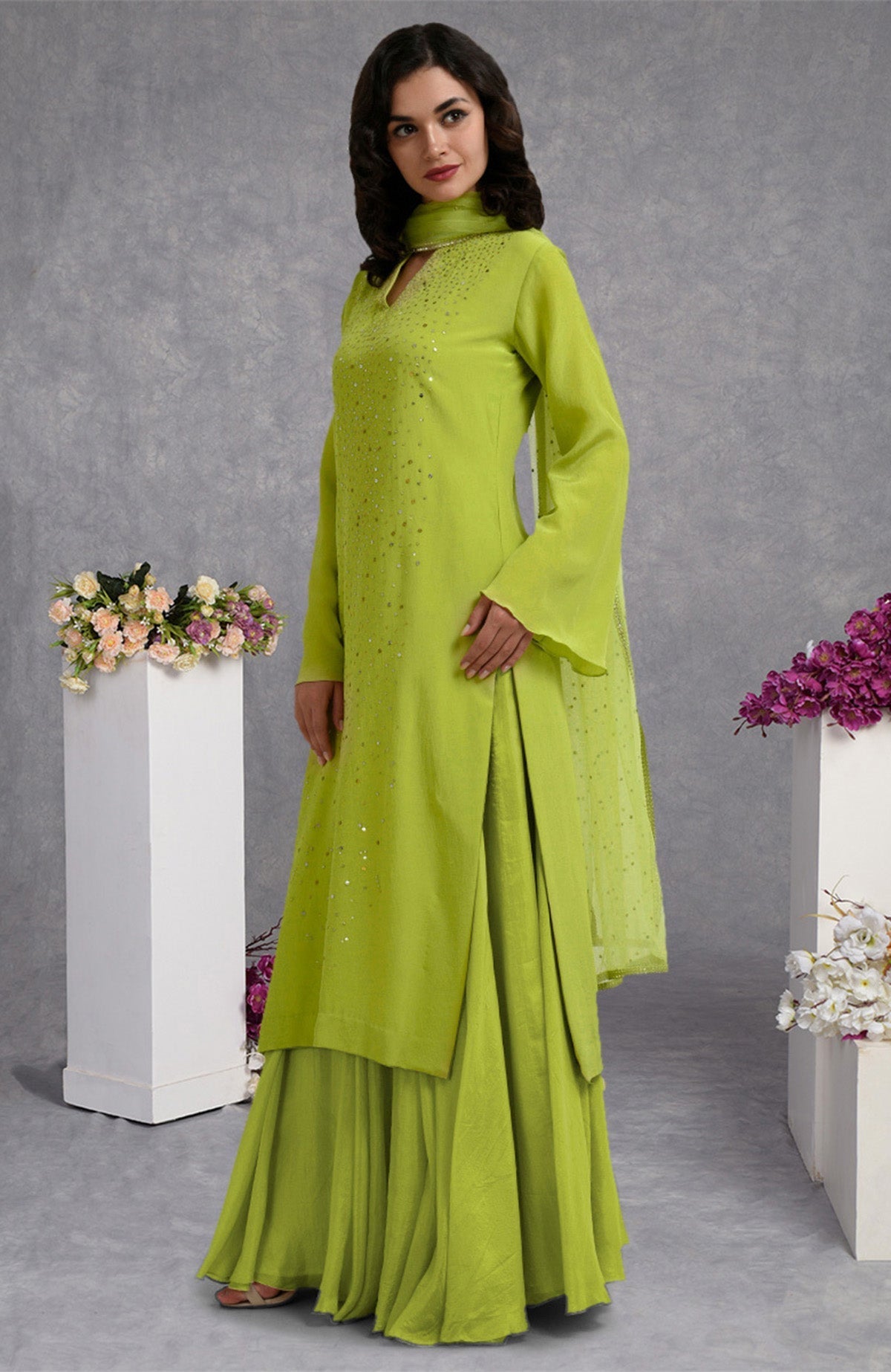 Lime punch crepe skirt set with hand-embroidered gold and silver sequins and sheer bell sleeves