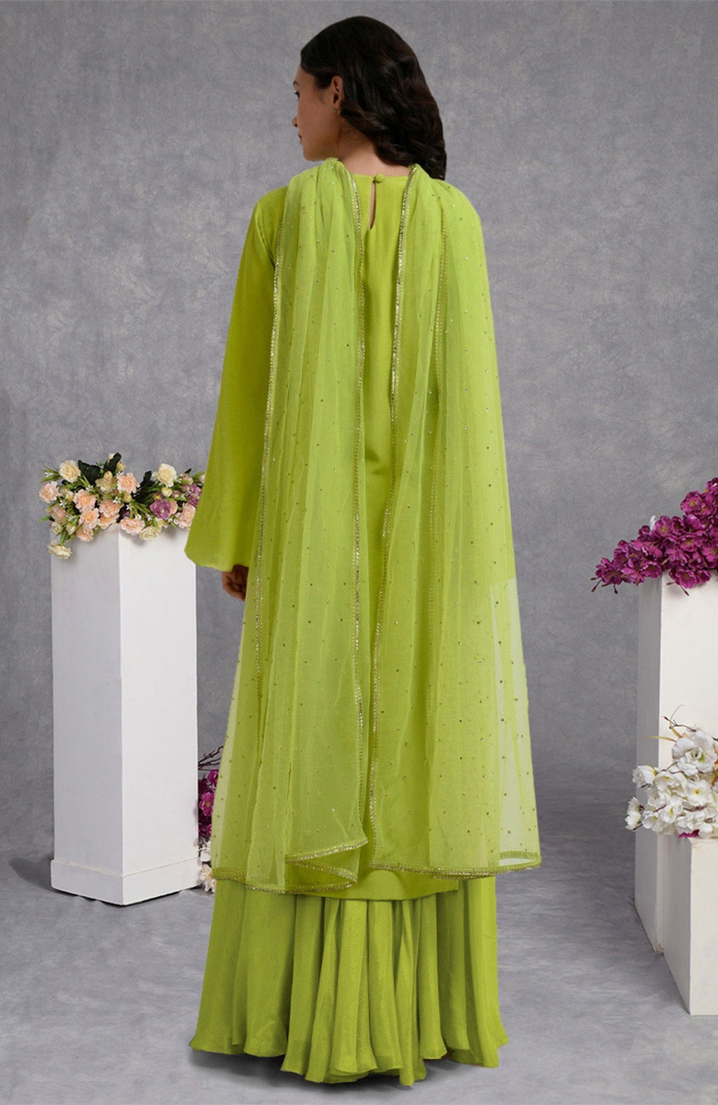 Lime punch crepe skirt set with hand-embroidered gold and silver sequins and sheer bell sleeves
