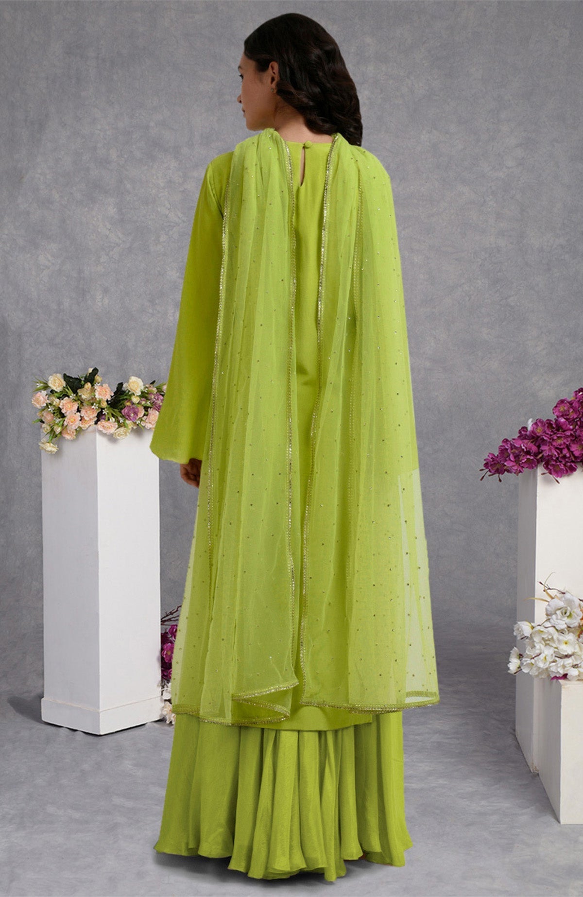 Lime punch crepe skirt set with hand-embroidered gold and silver sequins and sheer bell sleeves