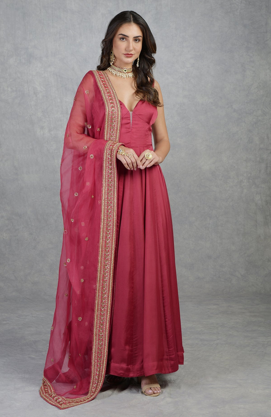 Garnet red anarkali set with hand-embroidered zardozi floral motifs and organza dupatta.