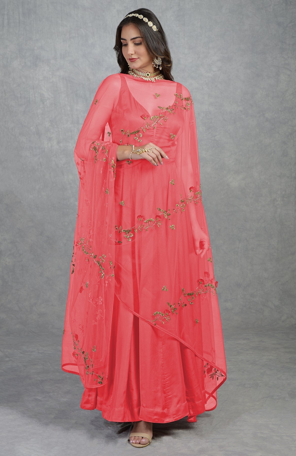 Garnet red Anarkali set with 3D floral suede petals and hand-embroidered crystal beads on tulle.