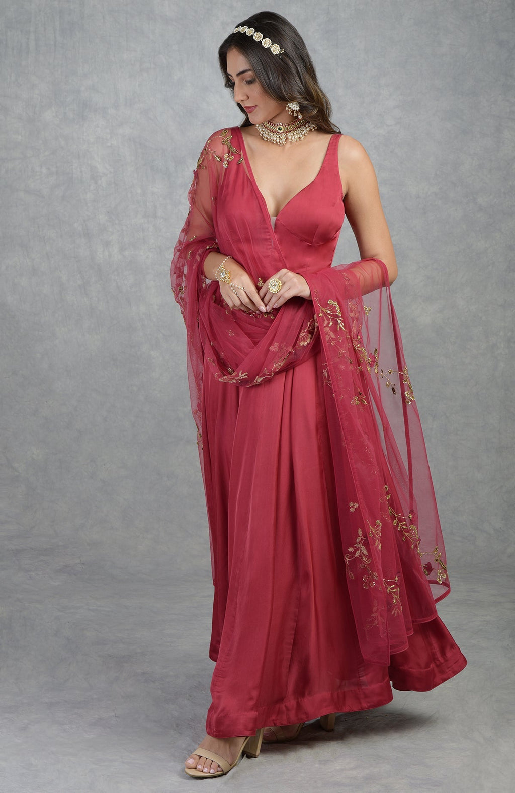 Garnet red Anarkali set with 3D floral suede petals and crystal bead hand embroidery on tulle.