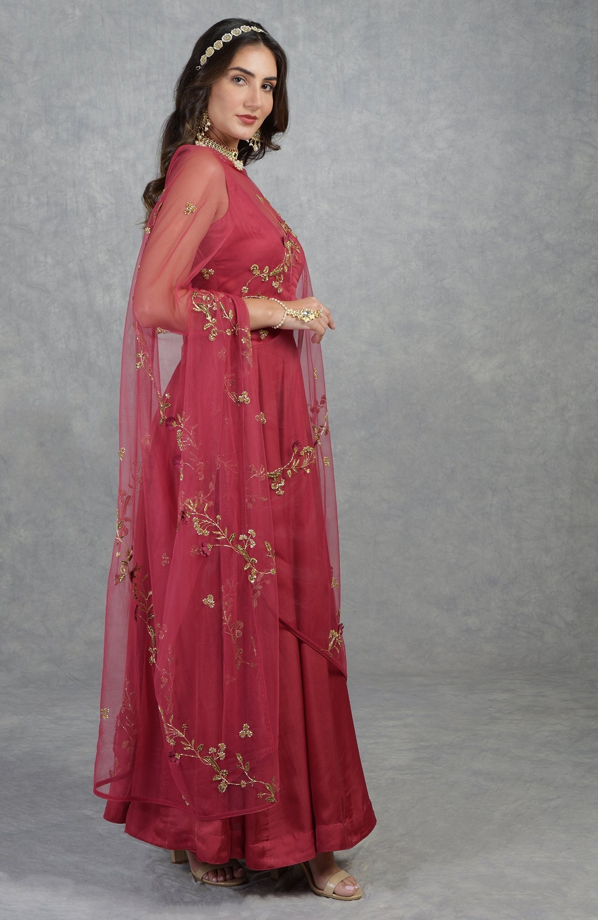 Garnet red Anarkali set with 3D floral suede petals and hand-embroidered crystal beads on tulle.