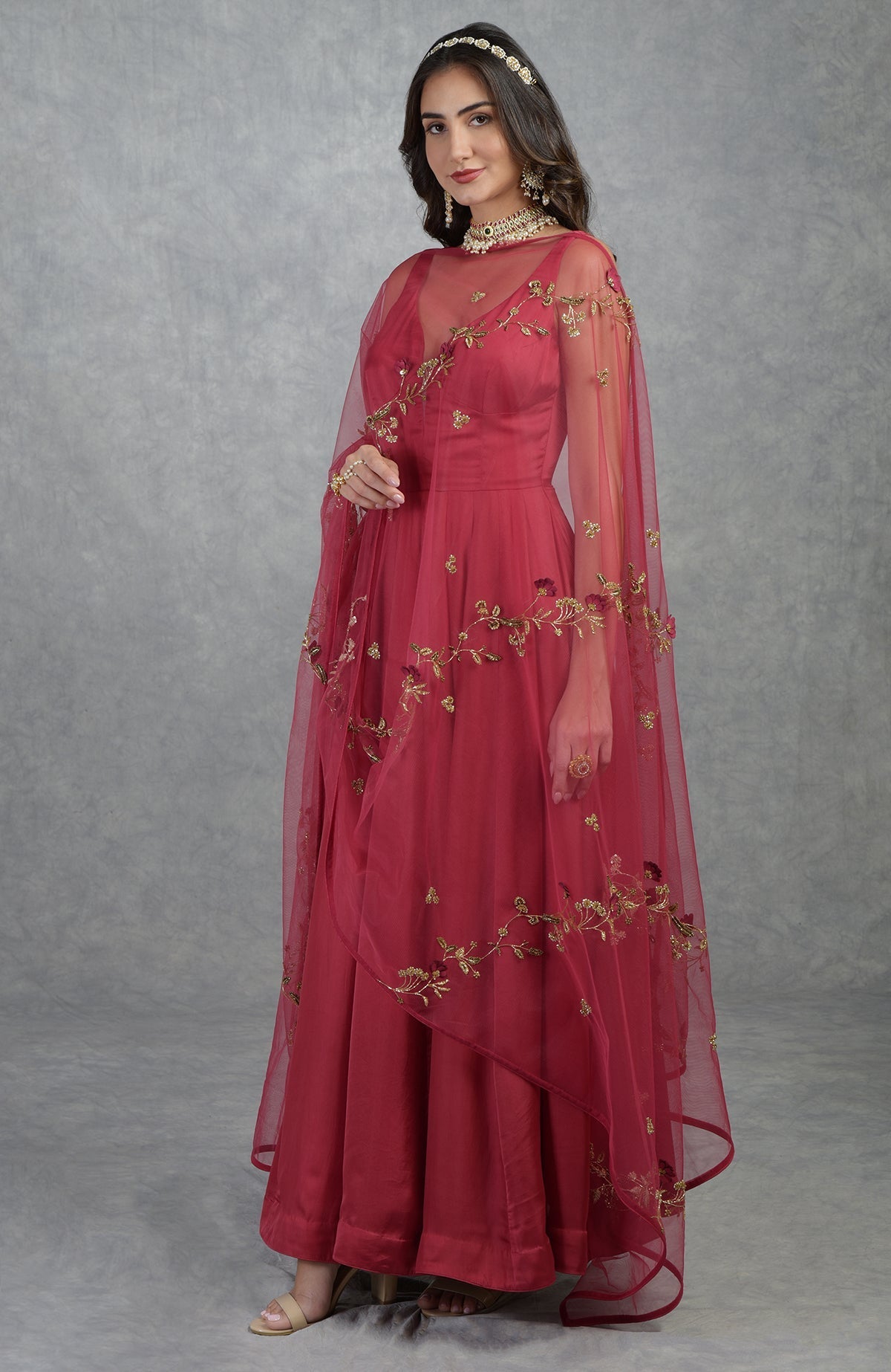 Garnet red Anarkali set with 3D floral suede petals and hand-embroidered crystal beads on tulle.