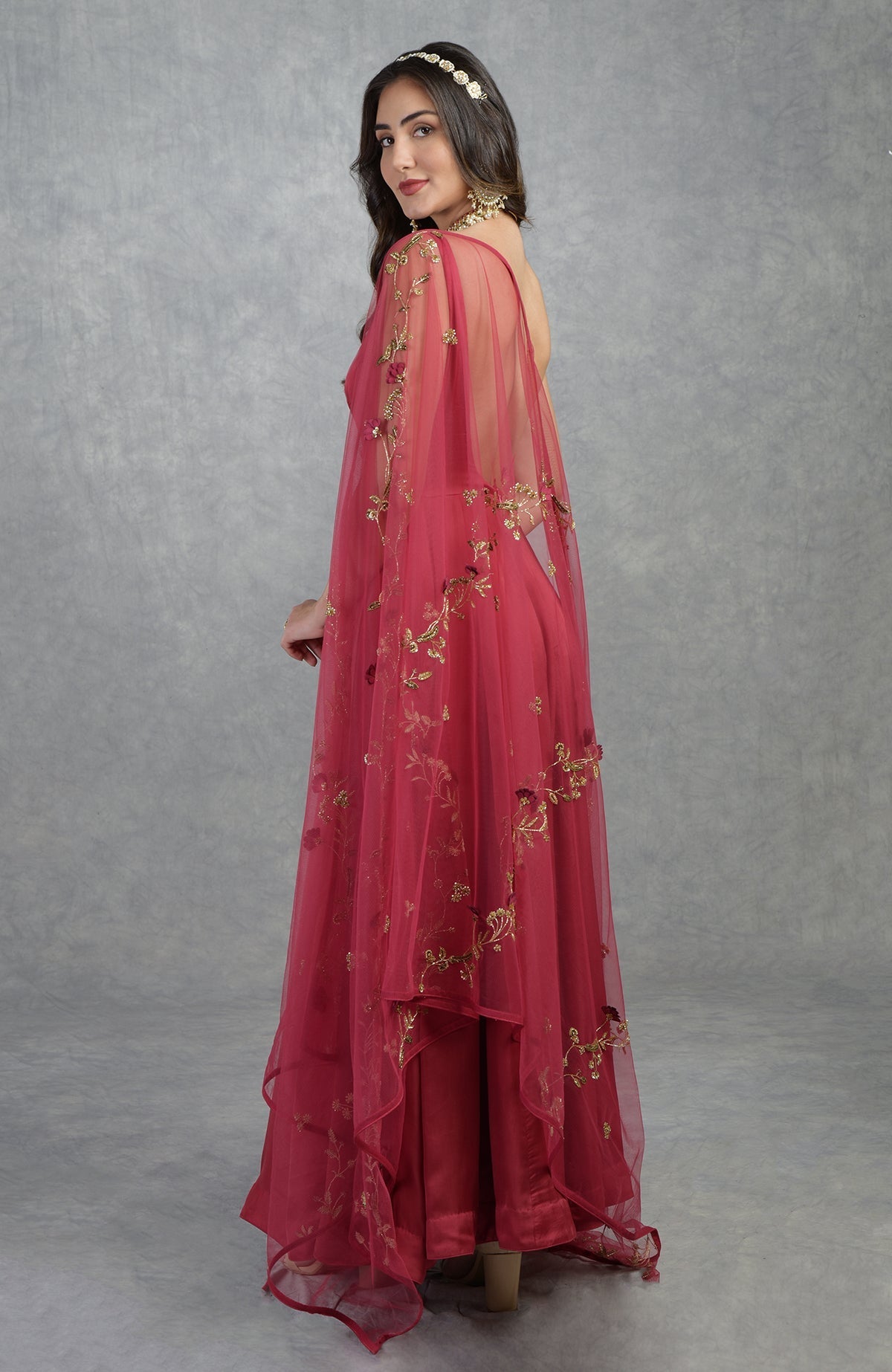 Garnet red Anarkali set with 3D floral suede petals and hand-embroidered crystal beads on tulle.