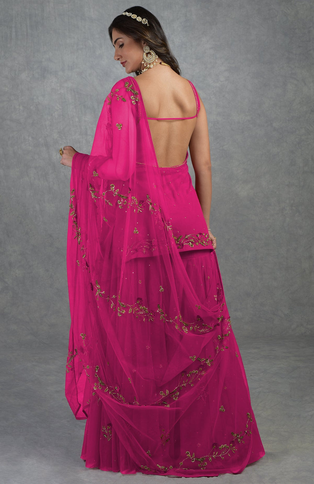 Raspberry sharara set with 3D floral and zardozi hand embroidery on tulle fabric.
