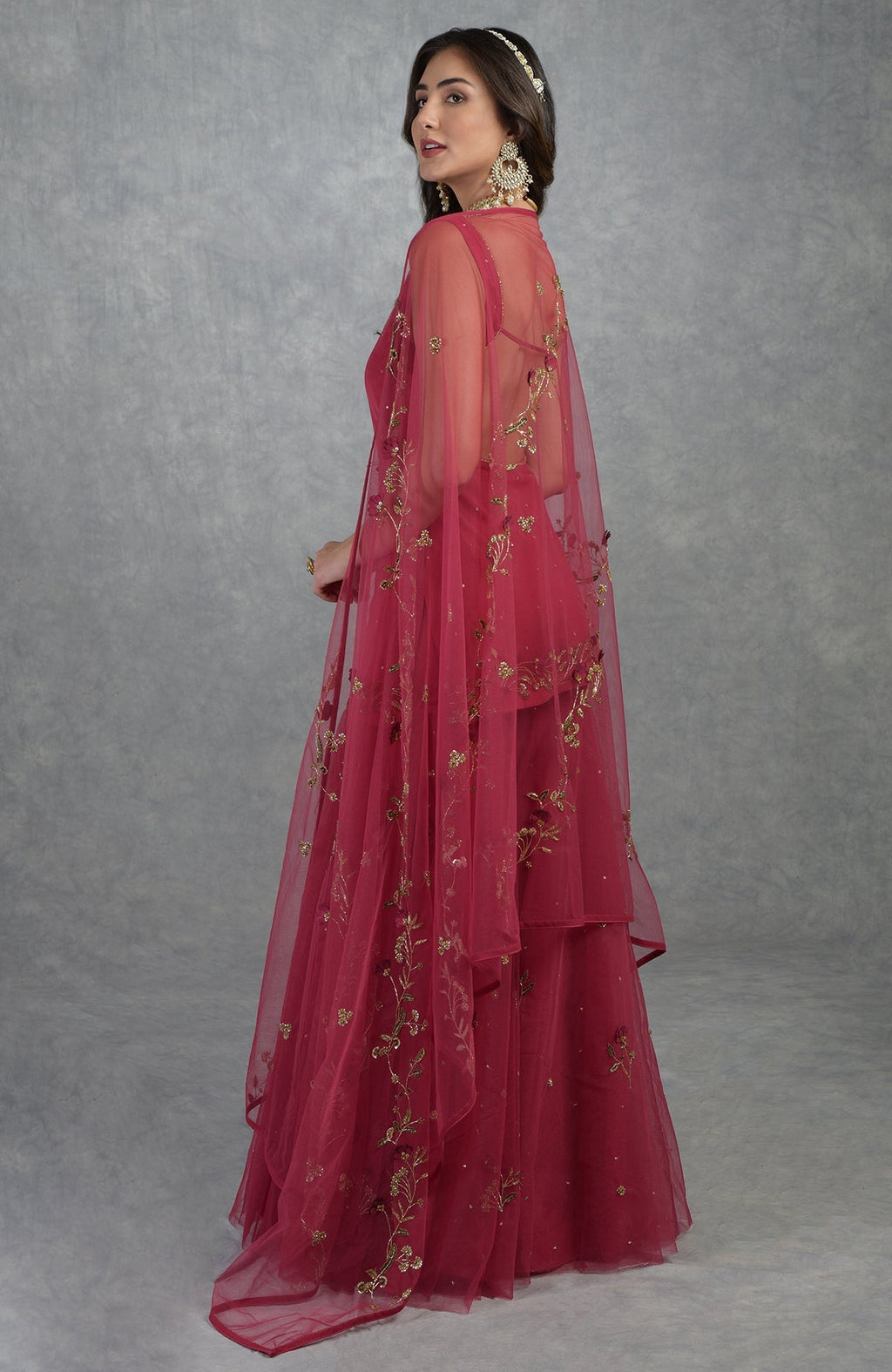 Red sharara set with 3D floral and zardozi hand embroidery on tulle fabric and deep scoop neck kurta