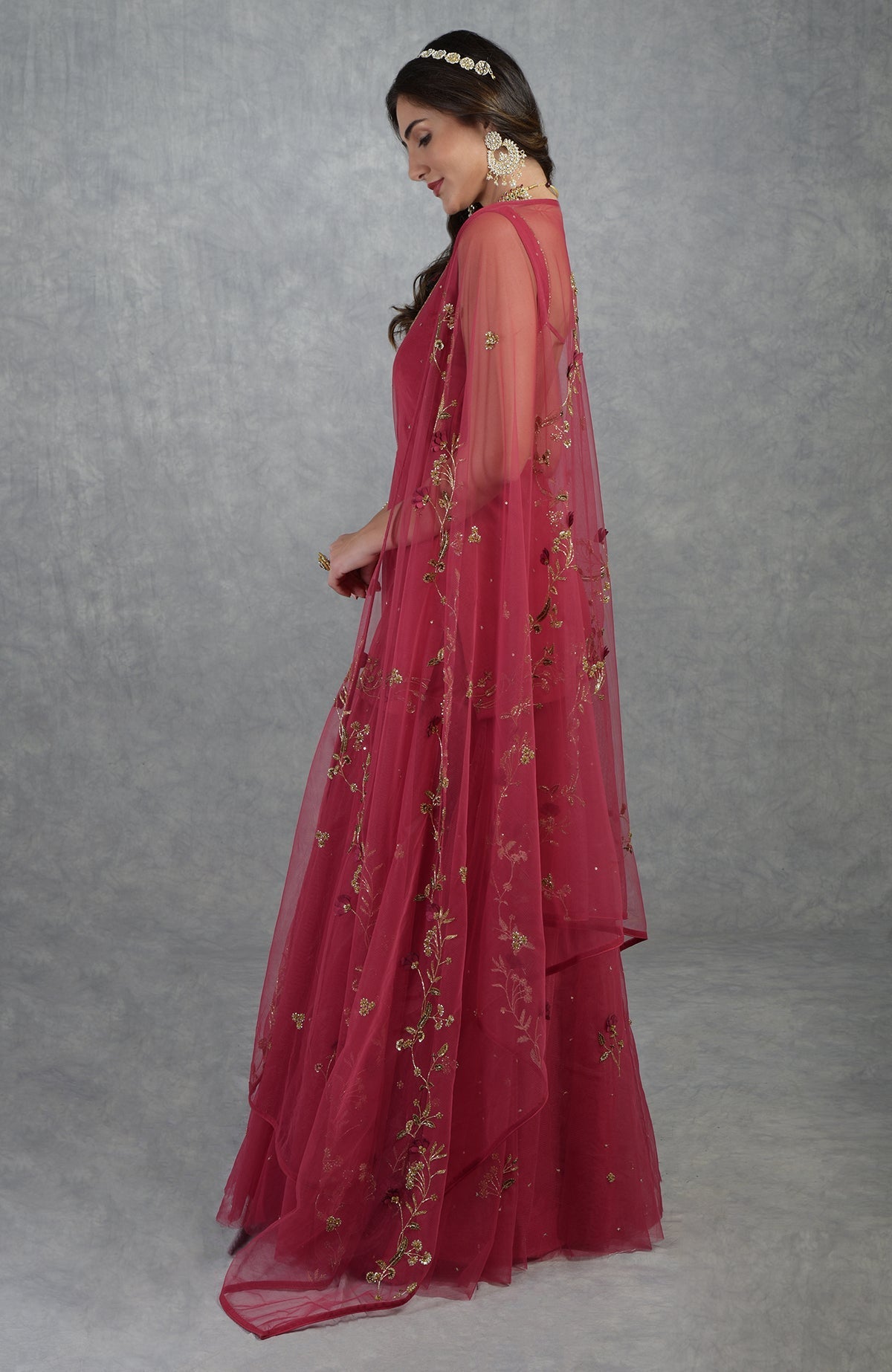 Red sharara set with 3D floral and gold zardozi hand embroidery on tulle fabric.