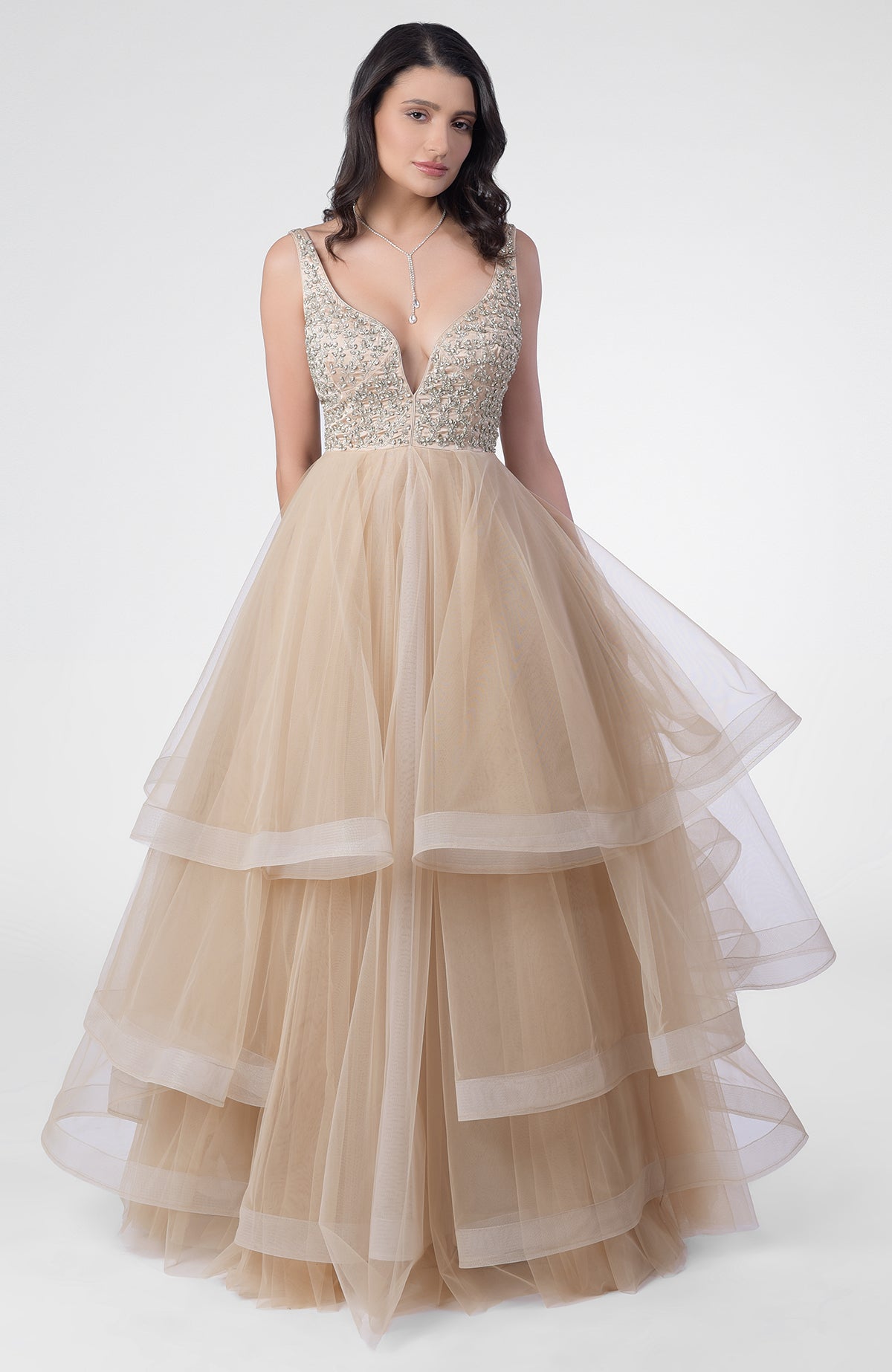Princesse Crystal hand-embroidered tiered princess gown with a sweetheart neckline.
