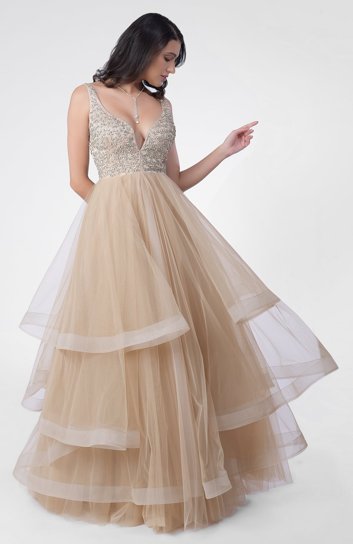 Princesse Crystal hand-embroidered tiered princess gown with a sweetheart neckline.