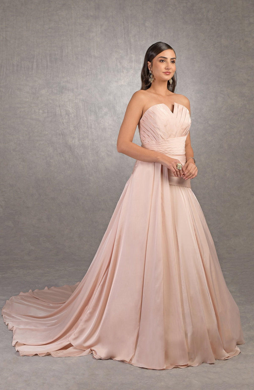 Strapless satin Athena gown with pleated bodice and circular train in a ballgown silhouette