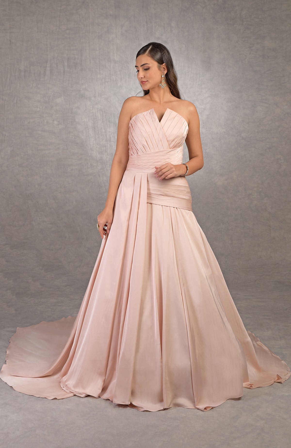 Strapless satin Athena gown with draped bodice and circular train for weddings