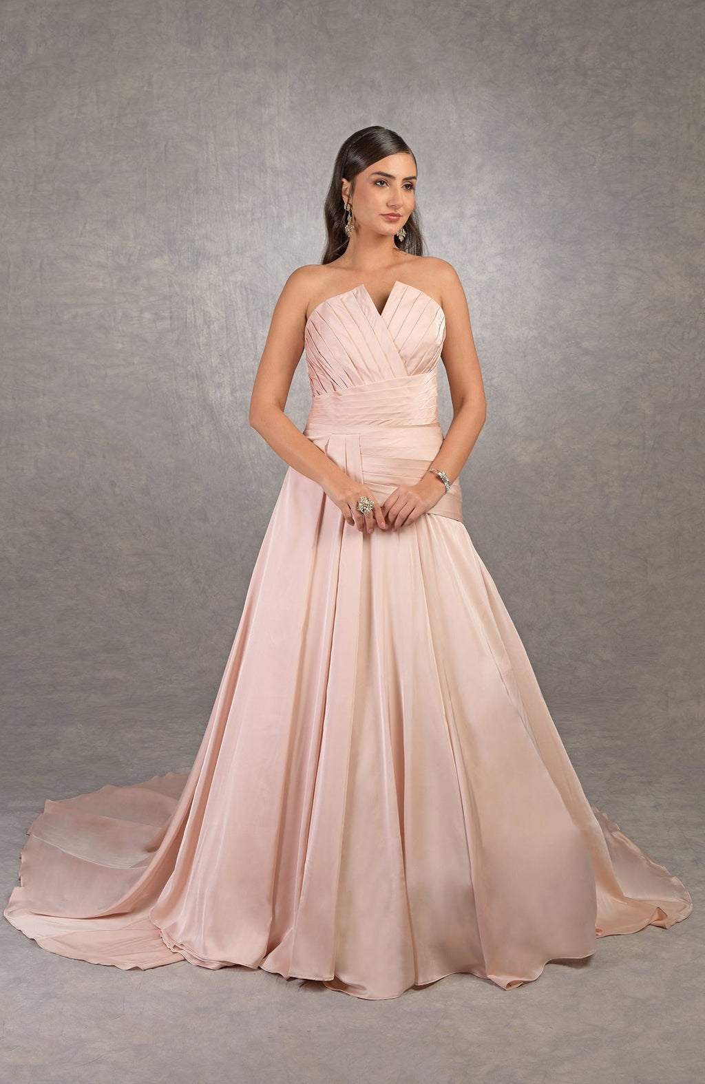 Strapless satin Athena gown with draped bodice and circular train in classic ballgown style