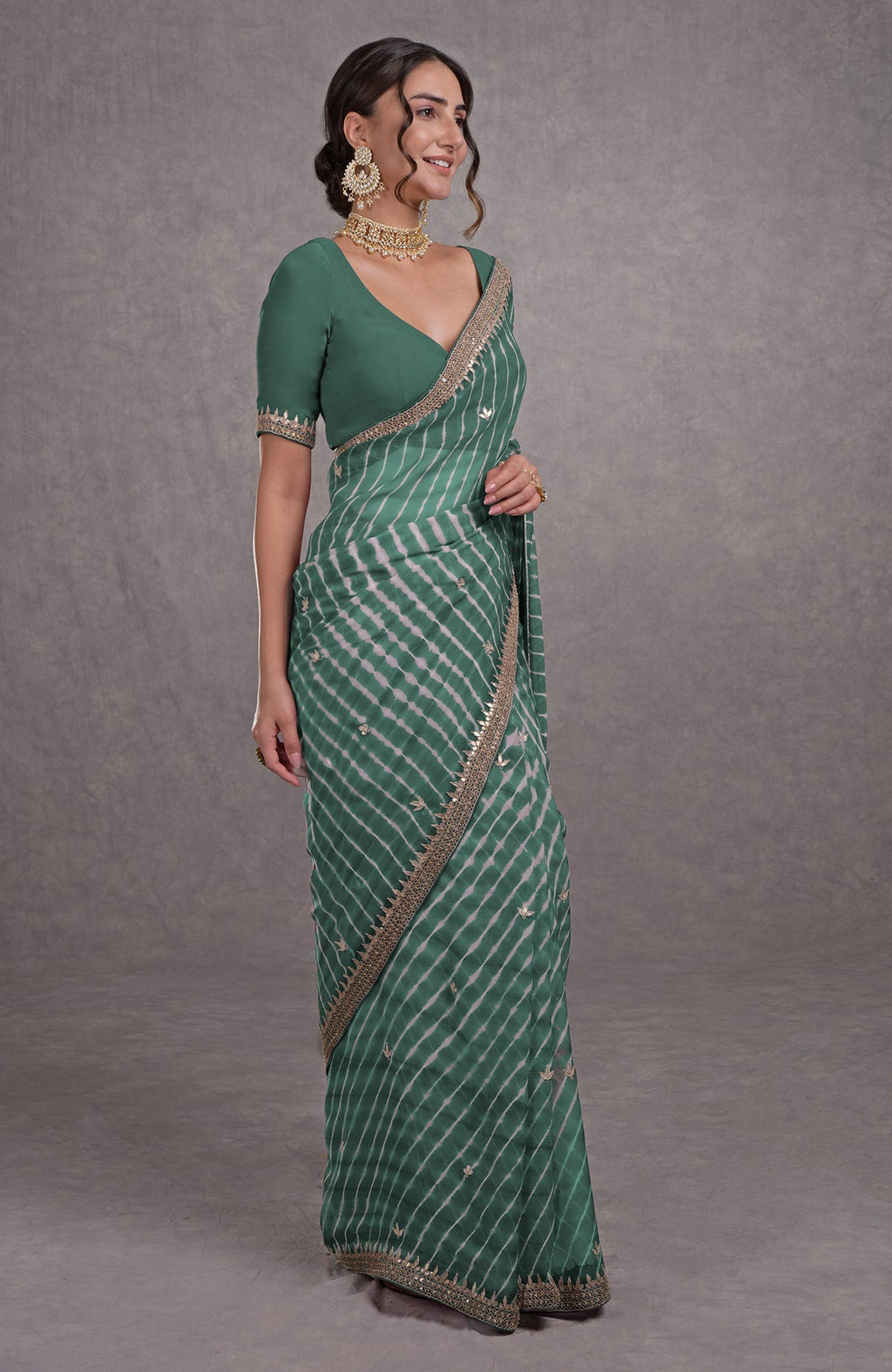 Jade leheriya saree with rosegold marori-gota patti hand embroidery.