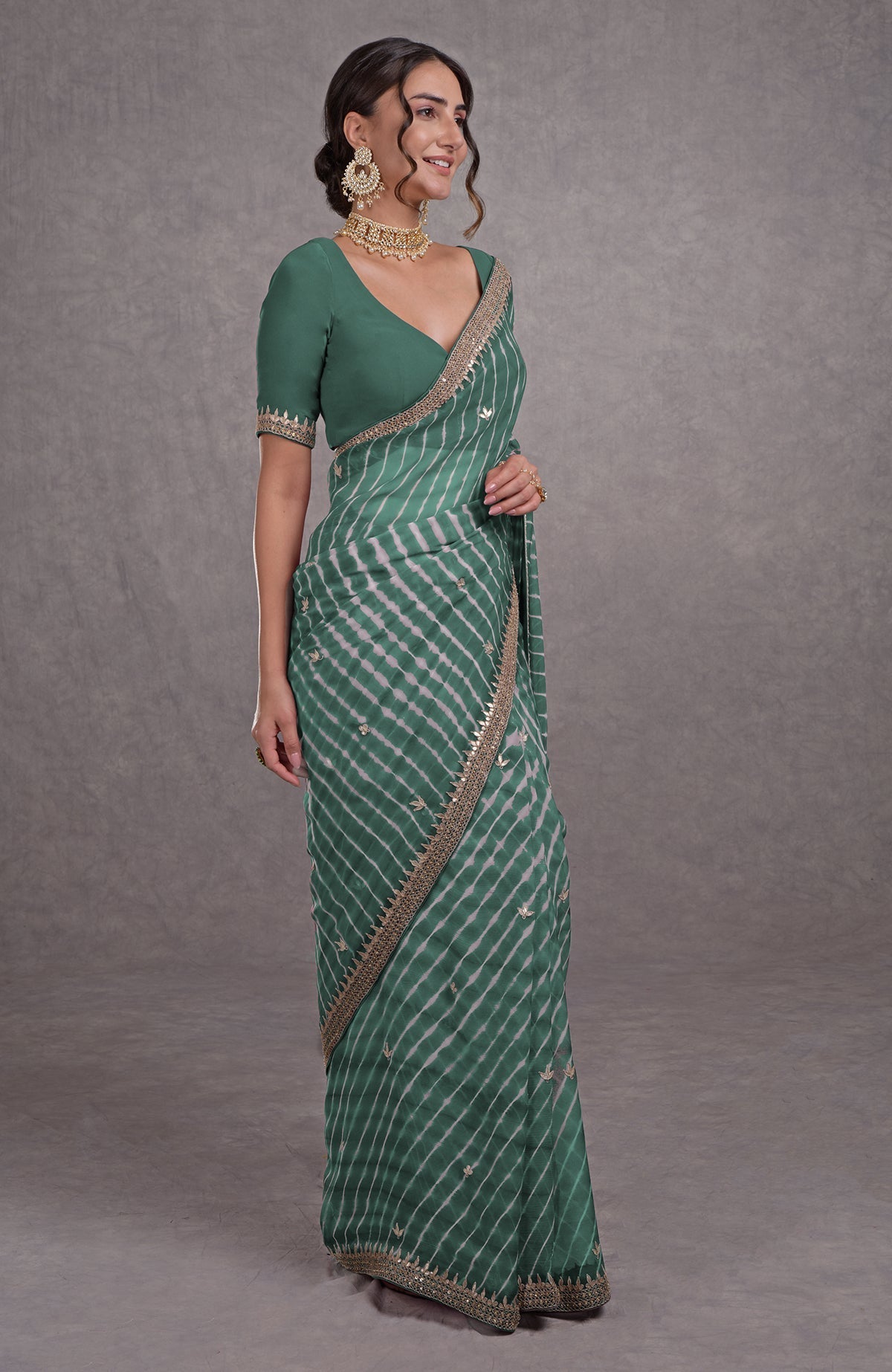 Jade leheriya saree with rosegold marori-gota patti hand embroidery.