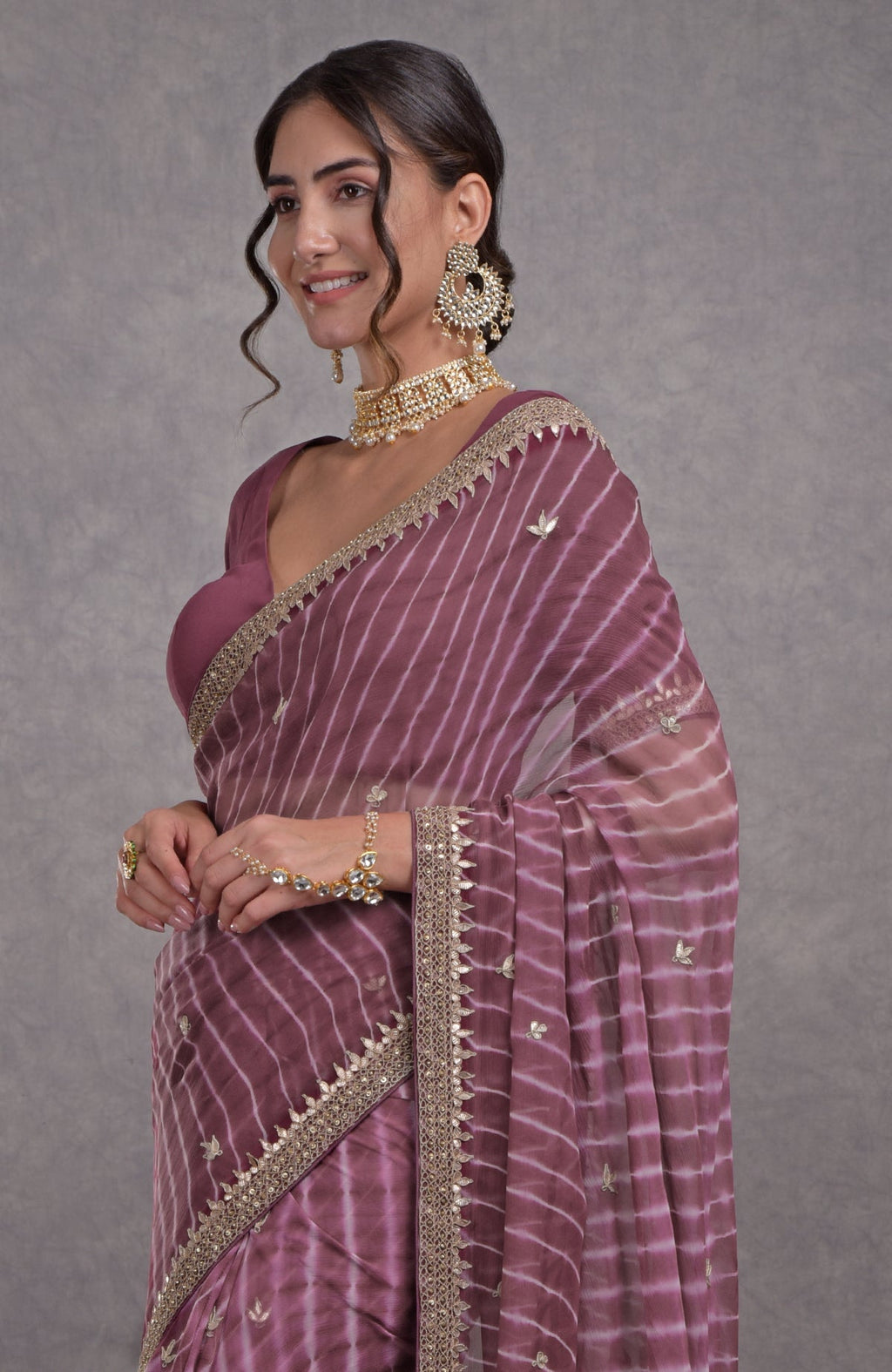 Burgundy chiffon saree with purple leheriya and rose gold marori-gota patti embroidery border and blouse