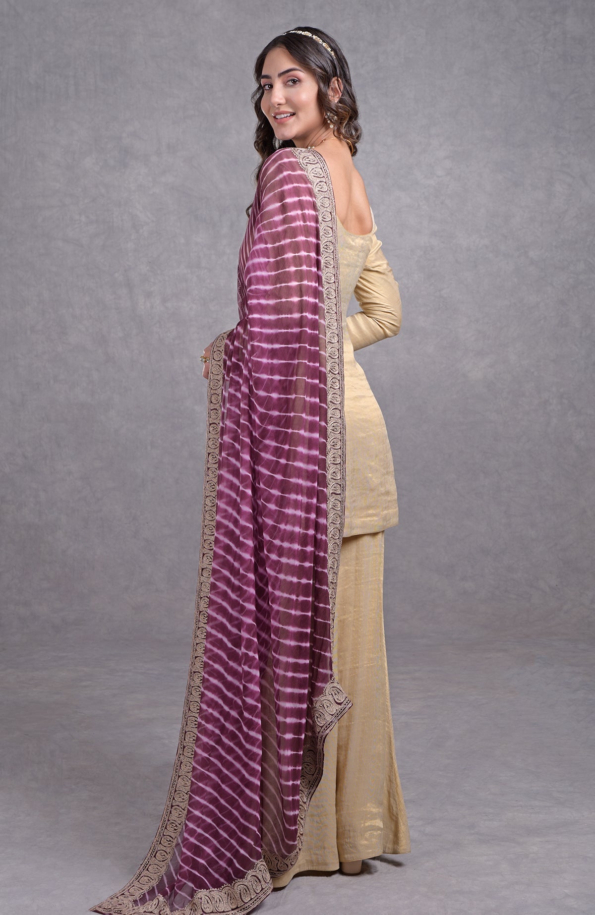 Burgundy purple chiffon dupatta with white leheriya and rose gold tilla border paired with tissue sharara suit